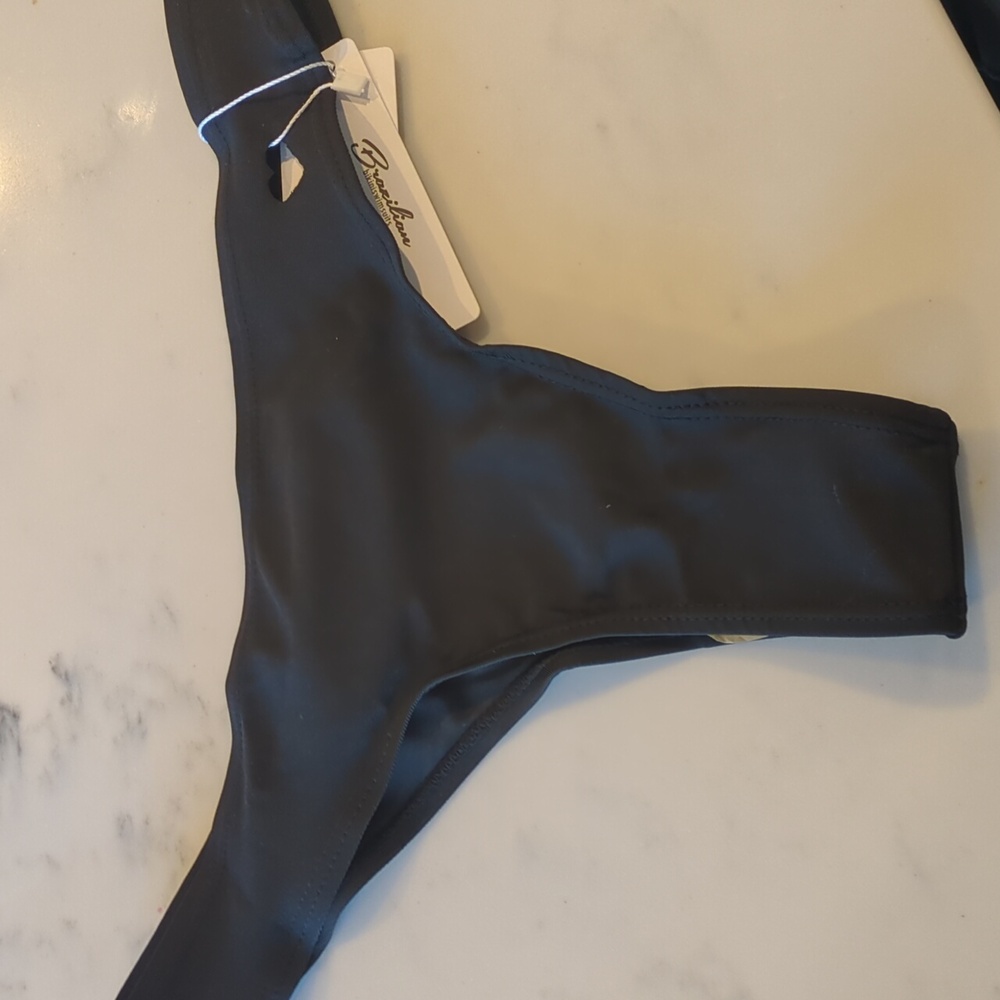 Black bikini thong with heart cutouts